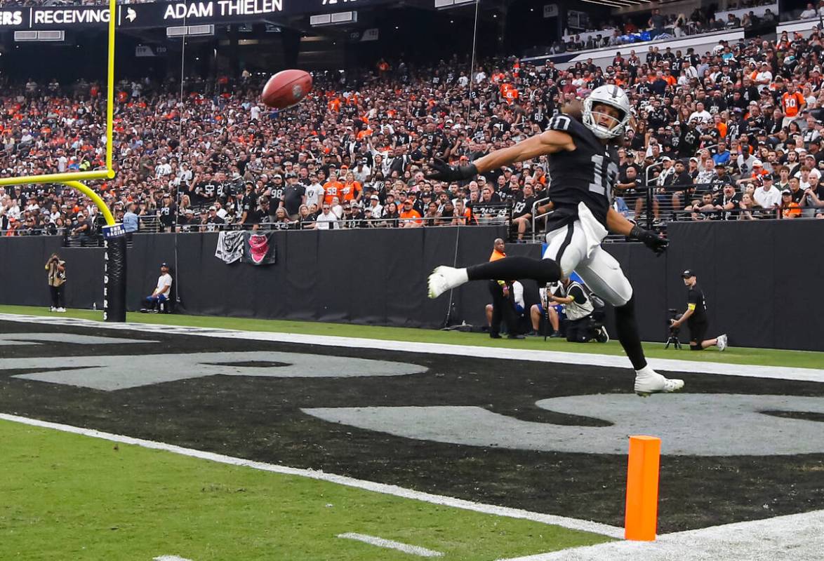 Raiders wide receiver Mack Hollins (10) jumps up to keep the punted ball out of the end zone du ...