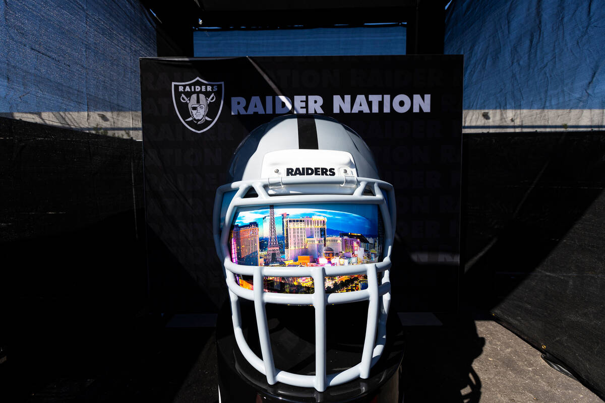 An oversized football helmet is pictured at the Modelo tailgate zone before the start of an NFL ...