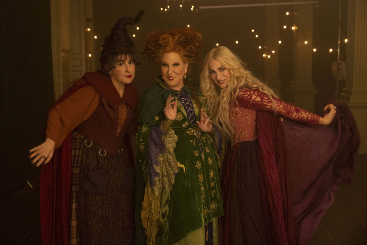 Kathy Najimy as Mary Sanderson, Bette Midler as Winifred Sanderson, and Sarah Jessica Parker as ...