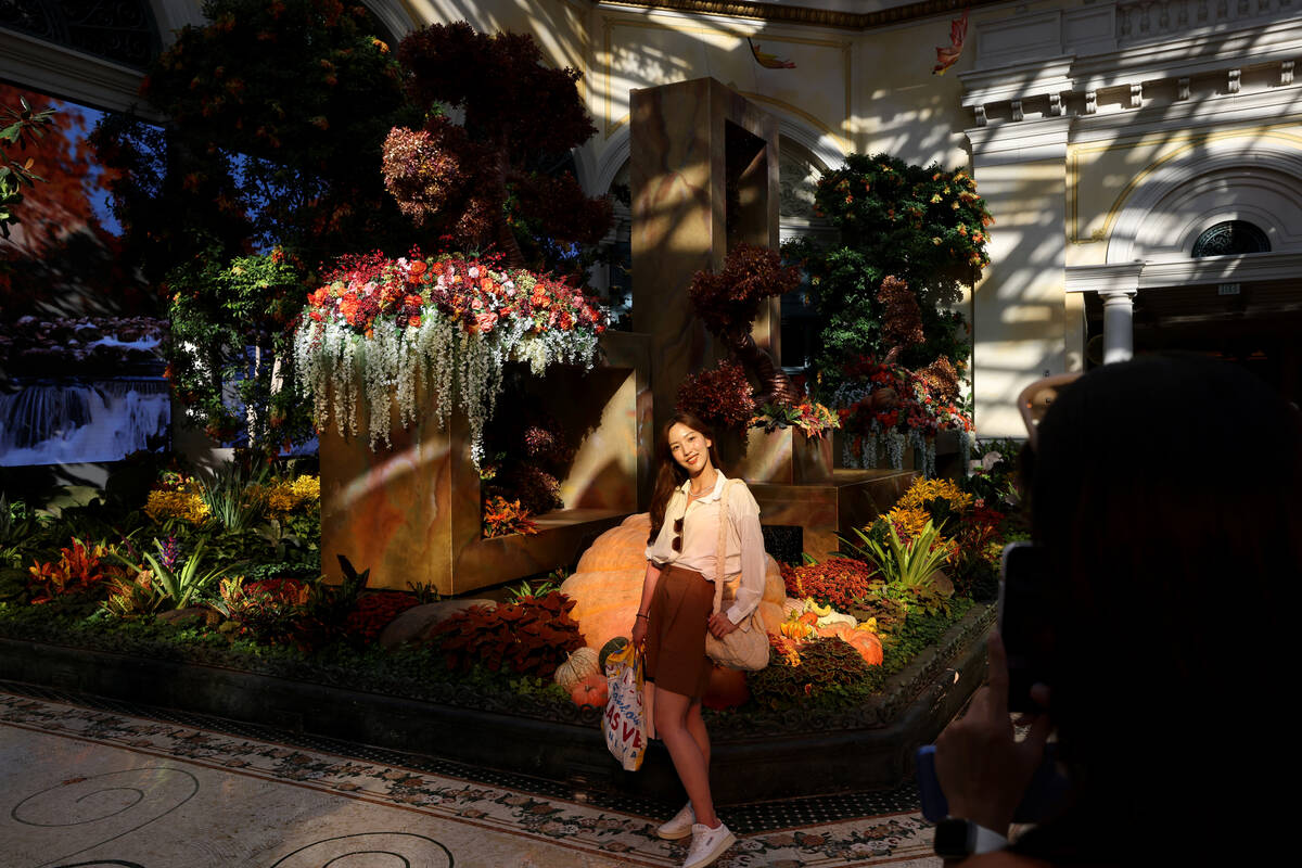 Guests, including Seonhoe Kim, take in the “Artfully Autumn” at Bellagio Conserva ...