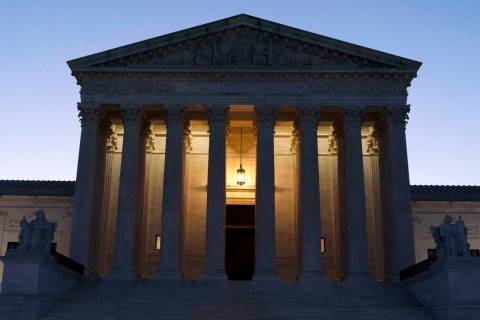 FILE - The U.S. Supreme Court is seen before sunrise on Capitol Hill in Washington, March 21, 2 ...