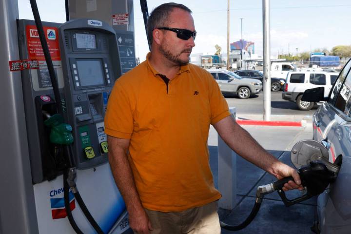 Steve LeFevre pumps gas at Chevron, on Tuesday, Oct. 4, 2022, in Las Vegas. (Bizuayehu Tesfaye/ ...