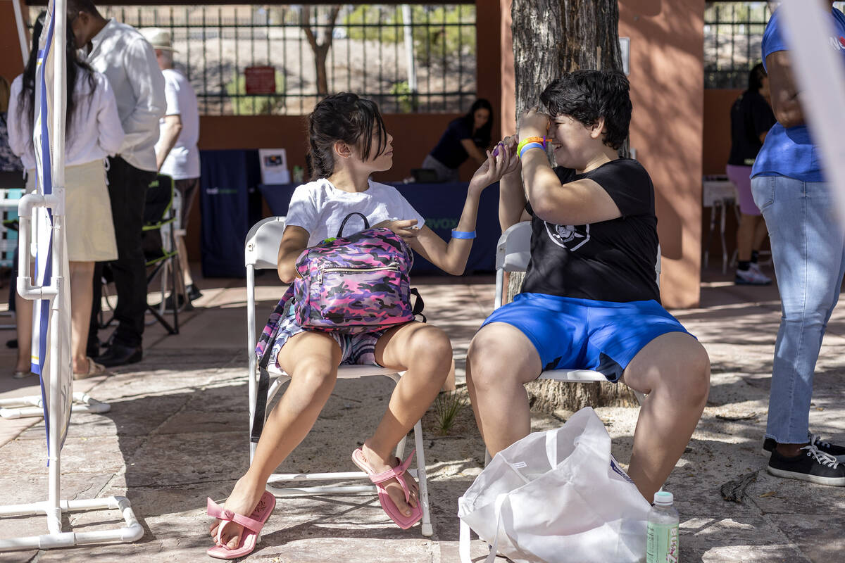 Violet Brandt, 11, left, and her brother Robert Brandt, 12, who has attention deficit disorder, ...