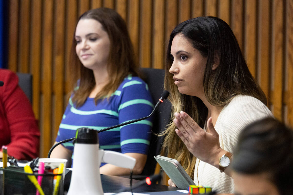 Clark County School Board members Katie Williams, left, and Danielle Ford participate during a ...