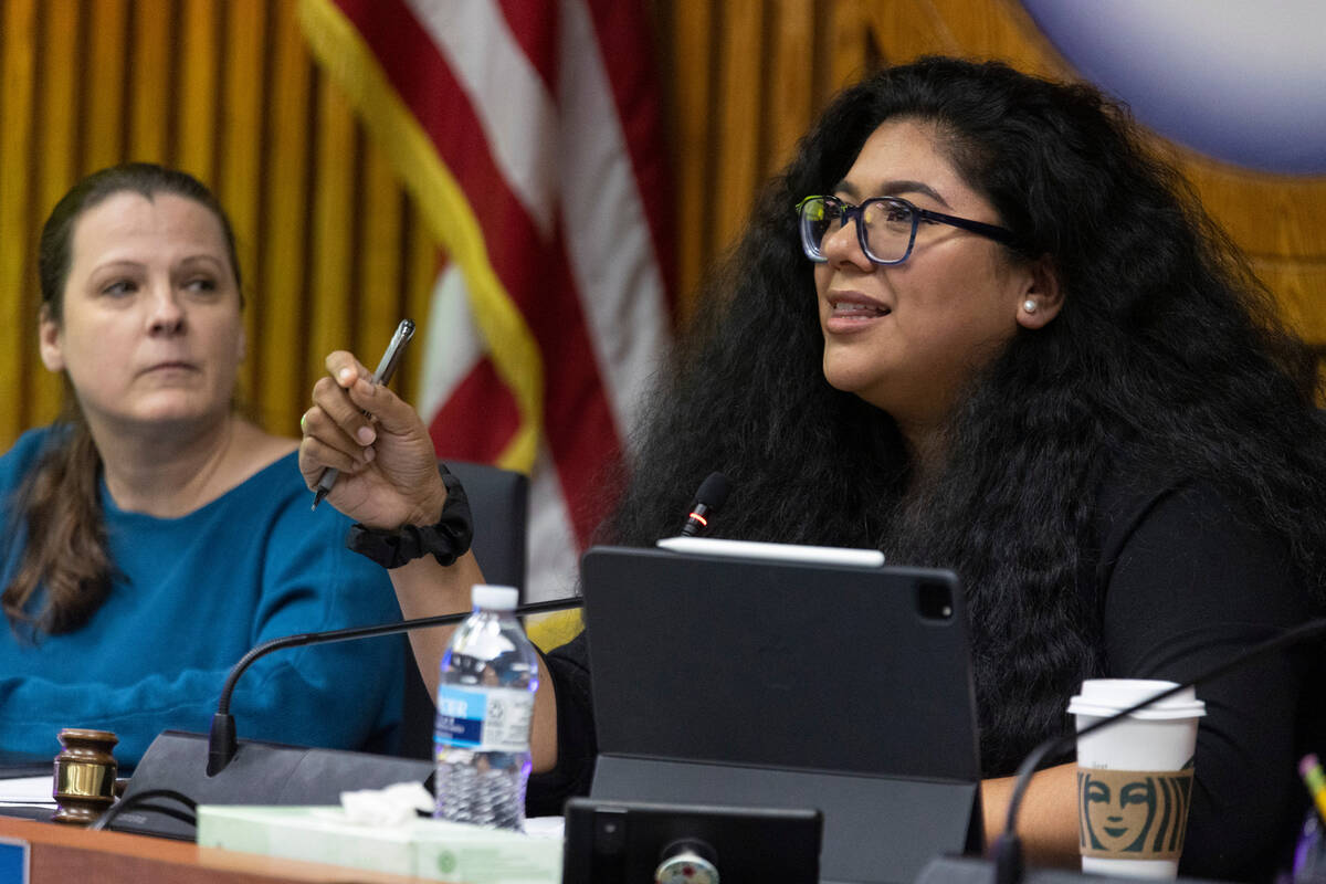 Clark County School Board of Trustees members Irene Cepeda, right, speaks during a Clark County ...
