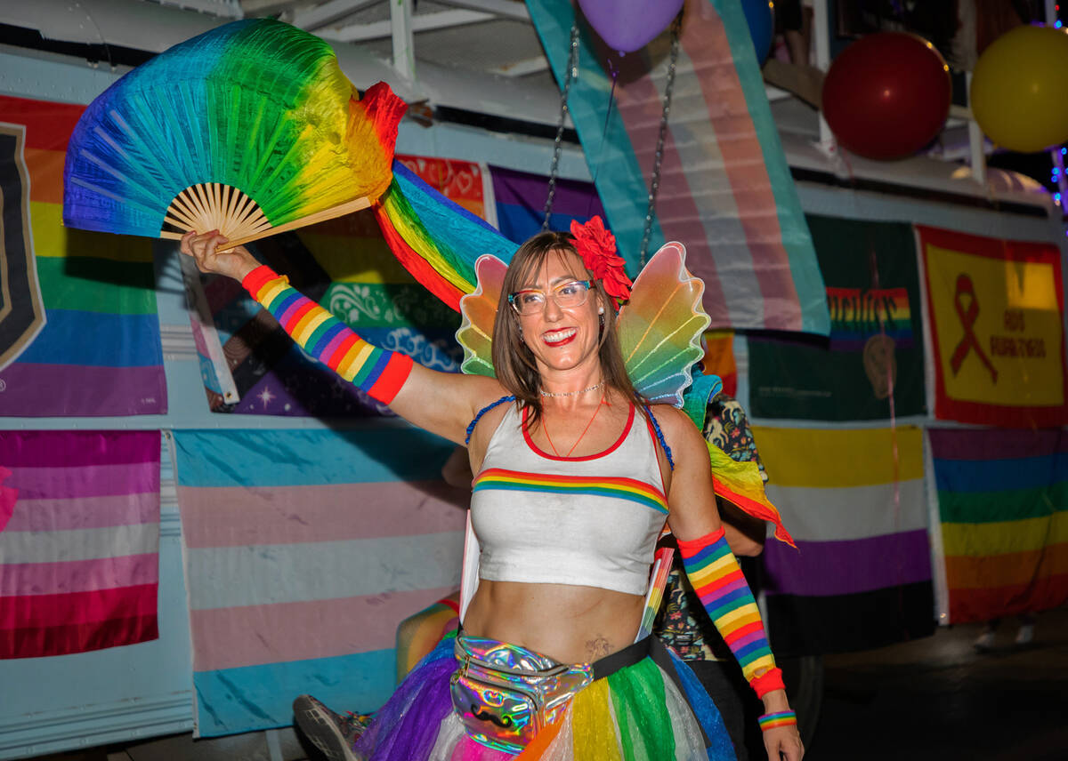 A member of the Phoenix Bar float in the annual downtown Pride parade on Friday, Oct. 7, 2022, ...
