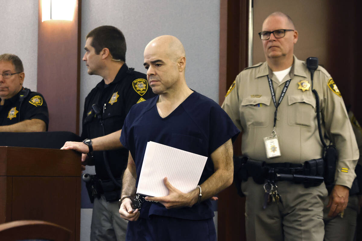 Outgoing Clark County Public Administrator Robert Telles, led into the courtroom at the Regiona ...