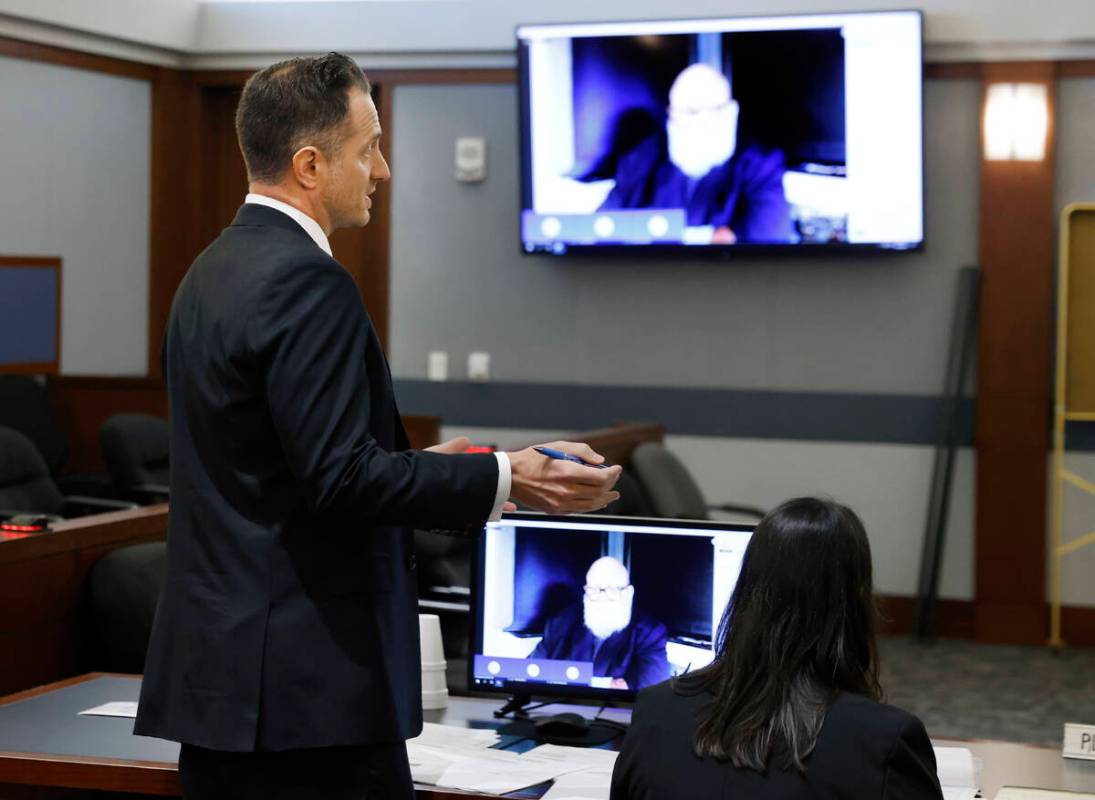 Jeffery Rogan, attorney representing Clark County, addresses the court during the outgoing Clar ...