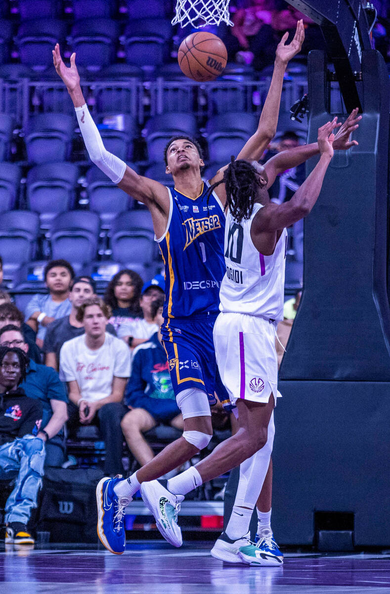 Metropolitans 92 center Victor Wembanyama (1) looks for a rebound over NBA G League Ignite forw ...