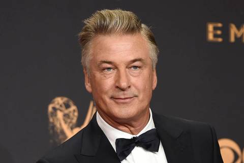 FILE - Alec Baldwin poses in the press room with the award for outstanding supporting actor in ...