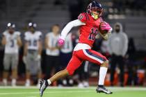 Coronado's Matthew Hunt (10) runs the ball after a catch for a touchdown against Shadow Ridge i ...