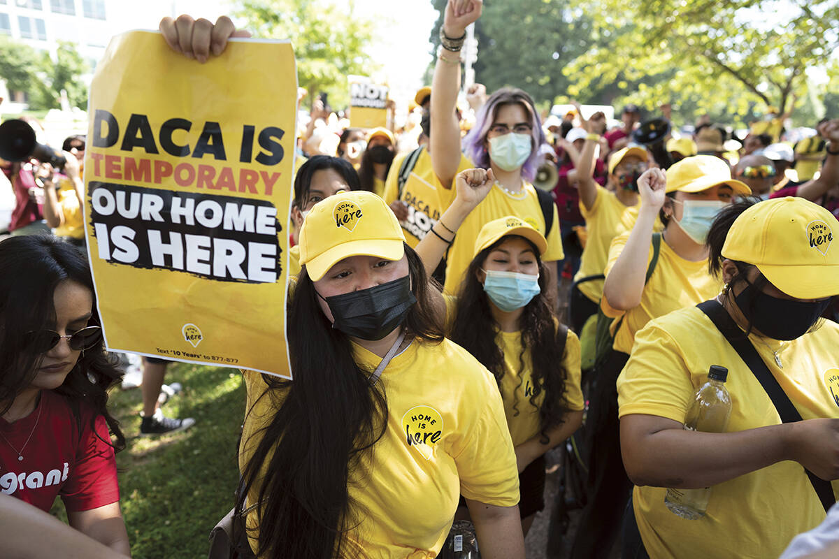 Susana Lujano, left, a dreamer from Mexico who lives in Houston, joins other activists to rally ...