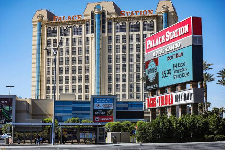 People wait at a bus stop in front of Palace Station in Las Vegas, Sunday, May 15, 2022. Safety ...