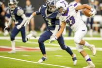 The Meadows defensive back Gage Rinetti (3) chases down Yerington running back Felix Garcia (23 ...