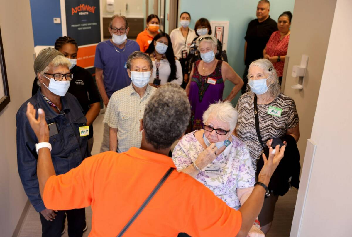 Seniors get a tour during a ribbon-cutting opening of an ArchWell Health center on West Sahara ...