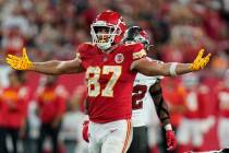 FILE - Kansas City Chiefs tight end Travis Kelce (87) celebrates a catch against the Tampa Bay ...
