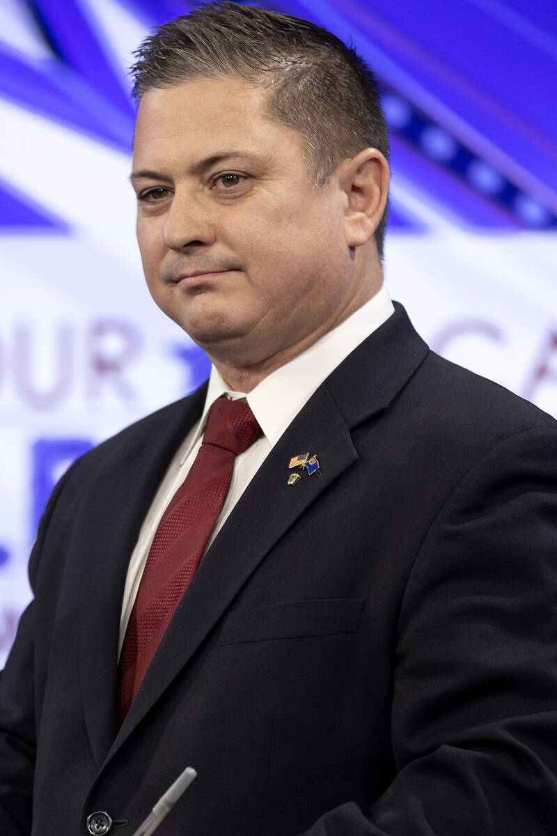 Republican candidate for U.S. Congress Sam Peters prepares for a debate with U.S. Rep. Steven H ...