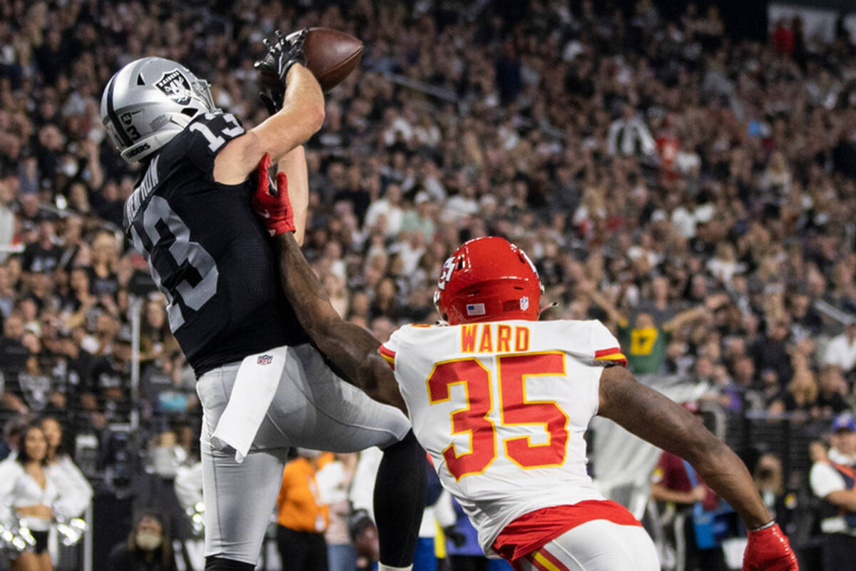 Raiders wide receiver Hunter Renfrow (13) makes a touchdown catch over Kansas City Chiefs corne ...