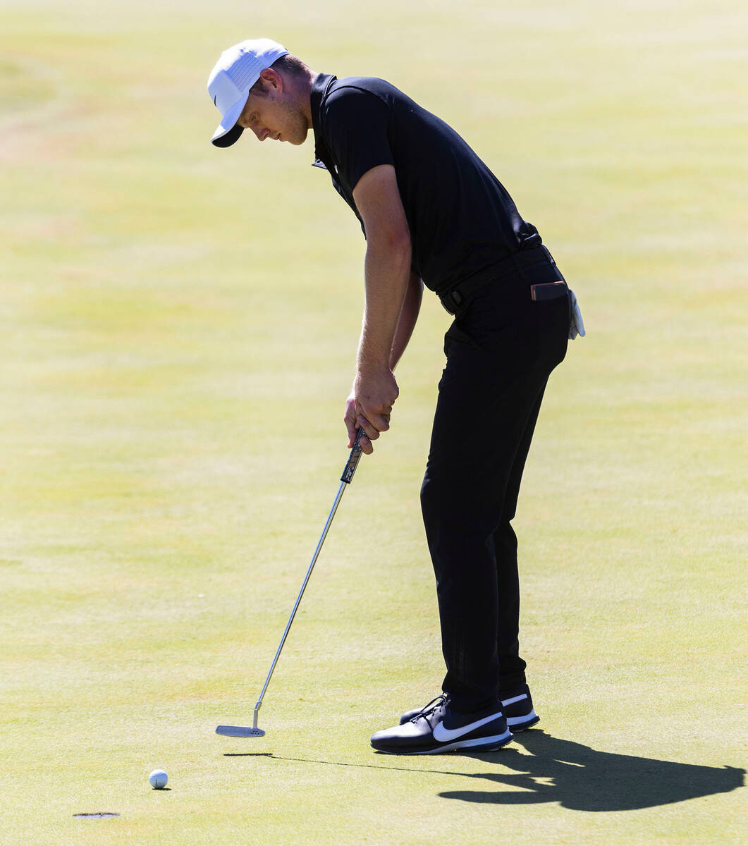 Cam Davis watches his putt on the ninth green during the second round of the Shriners Children' ...