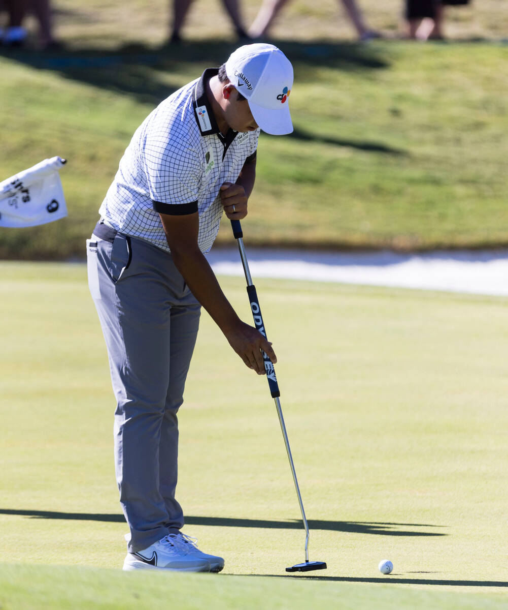 Si Woo Kim, of South Korea, watches his putt on the ninth green during the second round of the ...