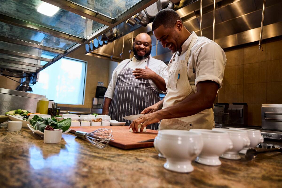 Chef JJ Johnson cooks with sous chef Kwame Williams. Pepsi Dig In is launching its first-ever R ...