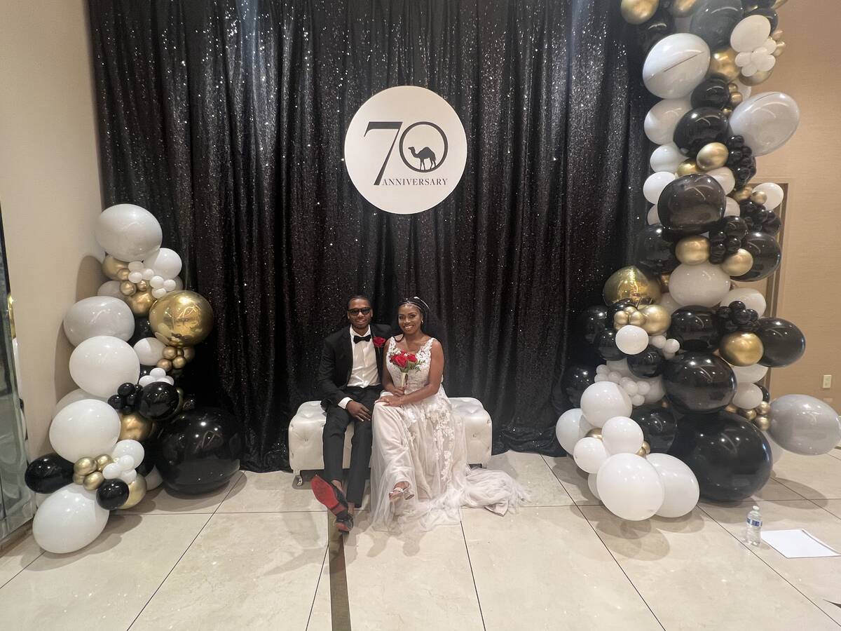Rasheed and Shay Hicks are shown at the Sahara's 70th-anniversary display just an hour after th ...