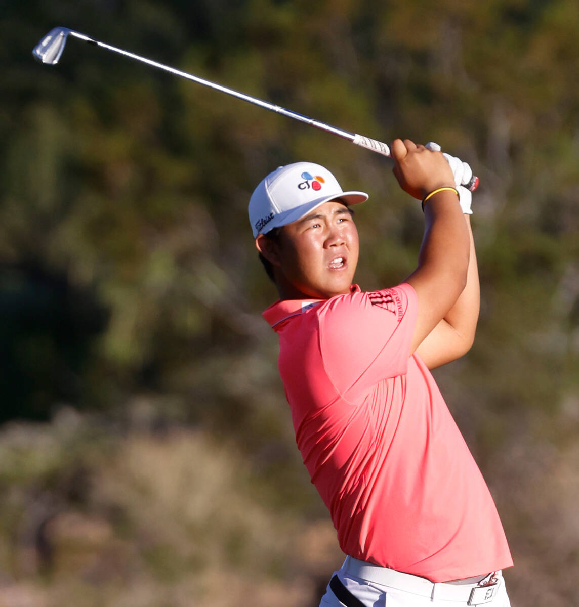 Tom Kim watches his drive to the eighteenth green during the third round of the Shriners Childr ...