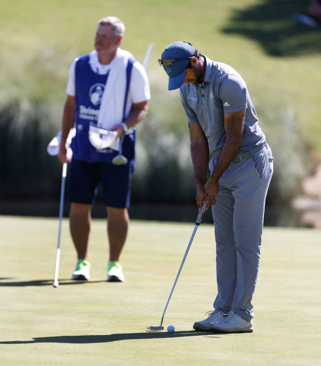 Aaron Rai watches his putt eighteenth green during the third round of the Shriners Children's O ...