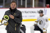 Golden Knights head coach Bruce Cassidy instructs his team during training camp practice at Cit ...