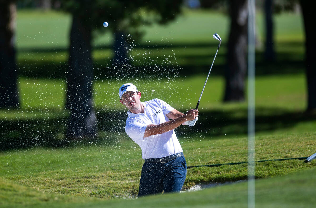 Patrick Cantlay digs out of the sand during the final day of play in the Shriners Children's Op ...