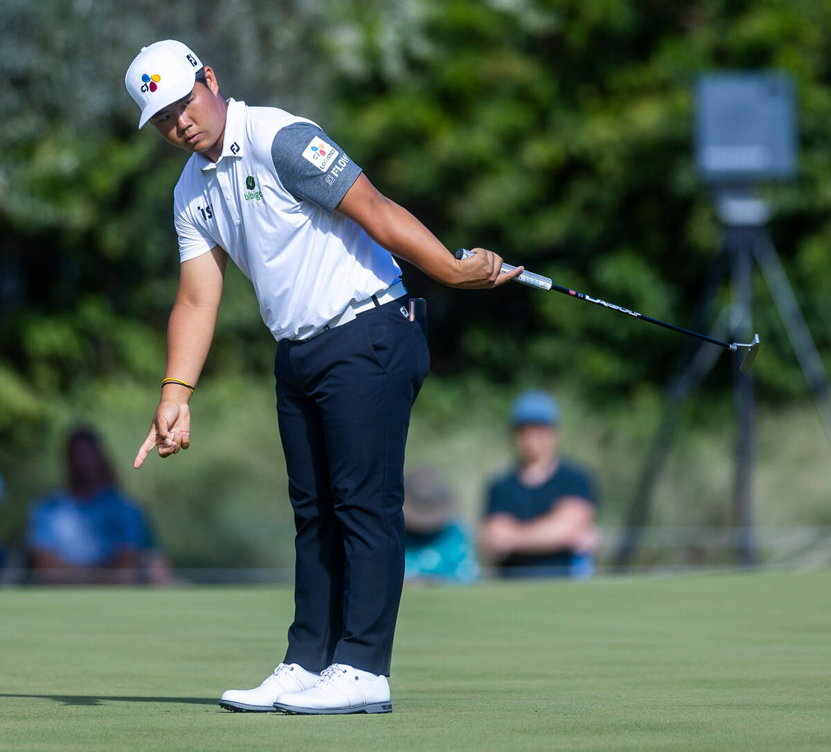 Tom Kim directs a putt to move over during the final day of play in the Shriners Children's Ope ...