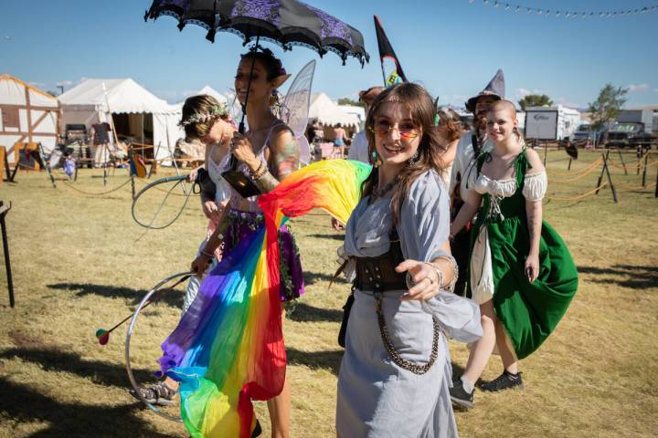 Alex Adair dances as a fairy with her friends at the Age of Chivalry Renaissance Festival on Su ...