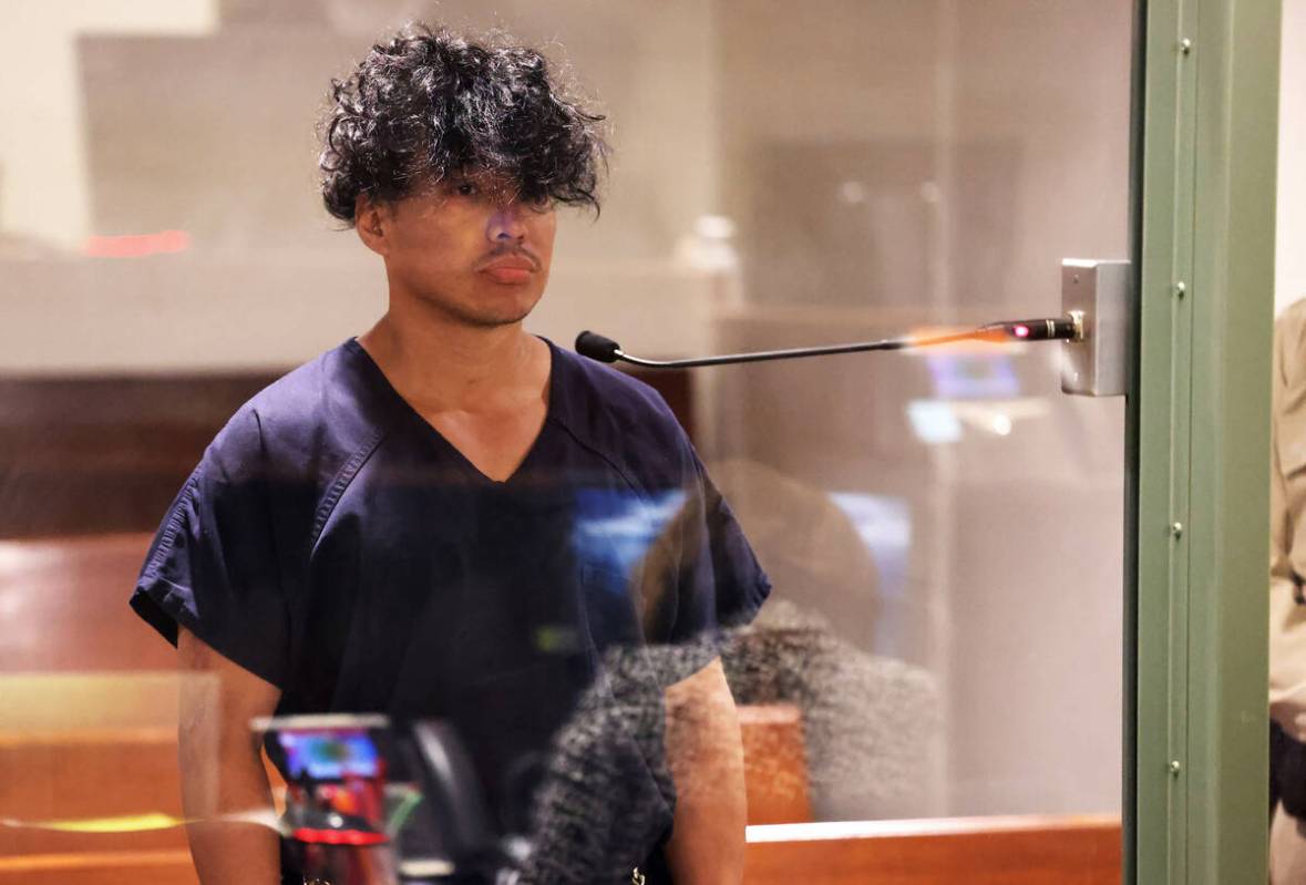 FILE - Strip stabbing spree suspect Yoni Barrios, 32, makes his initial court appearance at the ...
