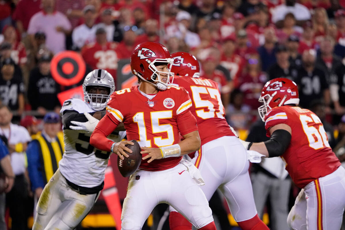Kansas City Chiefs quarterback Patrick Mahomes drops back to pass during the first half of an N ...