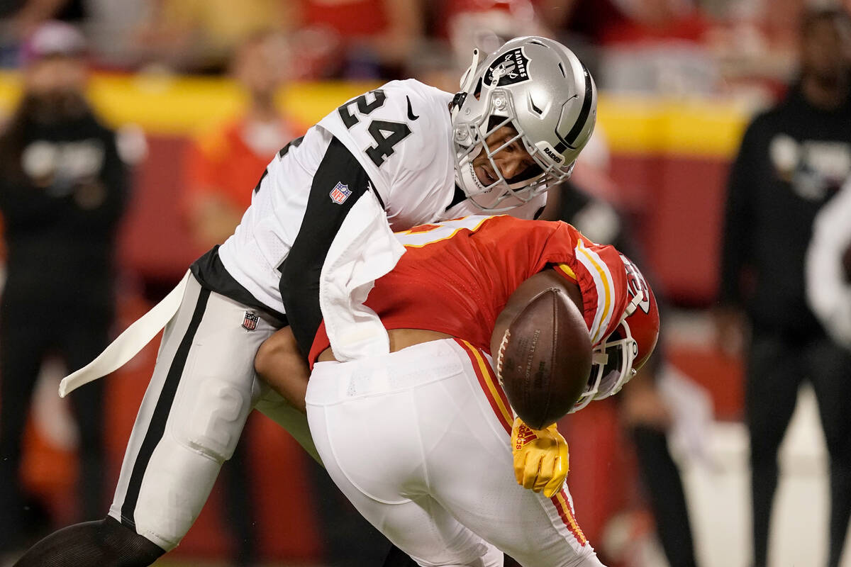 Las Vegas Raiders safety Johnathan Abram (24) breaks up a pass intended for Kansas City Chiefs ...