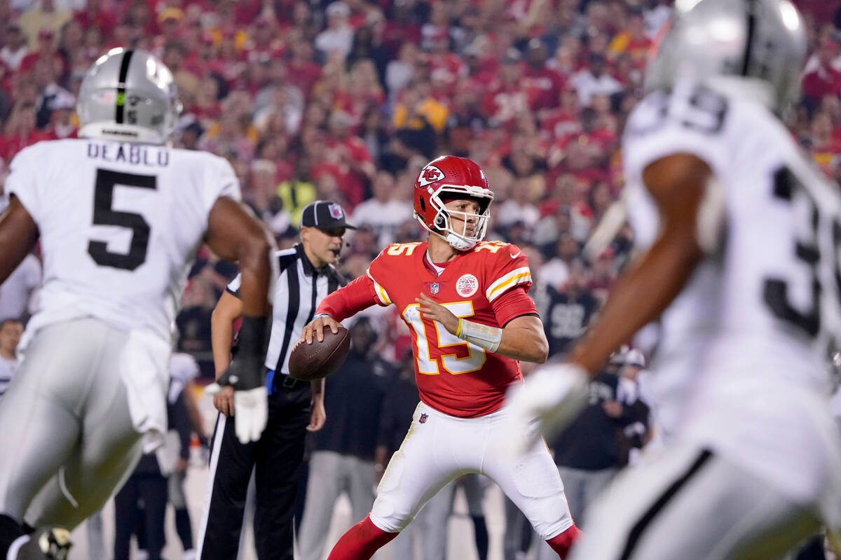 Kansas City Chiefs quarterback Patrick Mahomes throws during the first half of an NFL football ...