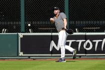Houston Astros starting pitcher Justin Verlander tosses a ball during a workout ahead of Game 1 ...