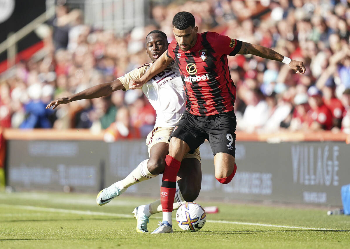 Leicester City's Kiernan Dewsbury-Hall, left, and Bournemouth's Dominic Solanke battle for the ...