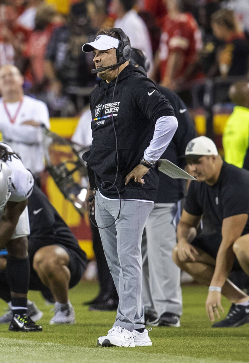 Raiders head coach Josh McDaniels watches the game against the Kansas City Chiefs from the side ...