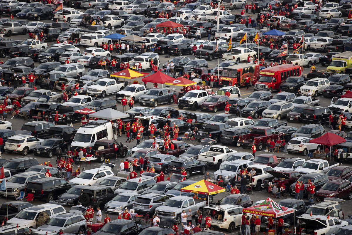Fans tailgate before the start of a NFL football game between the Raiders and the Kansas City C ...