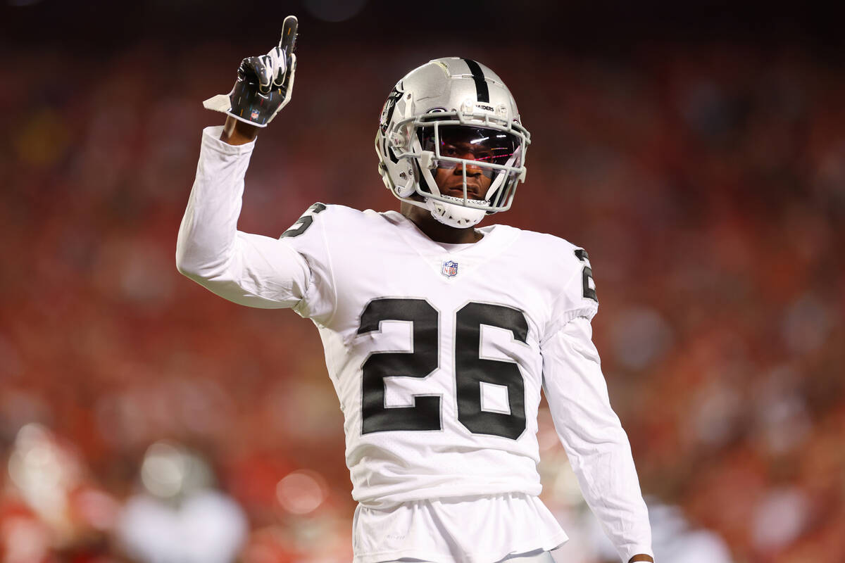 Raiders cornerback Rock Ya-Sin (26) raises his hand after breaking up a pass intended for Kansa ...
