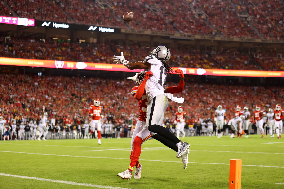 Kansas City Chiefs cornerback Jaylen Watson (35) defends a pass intended for Raiders wide recei ...