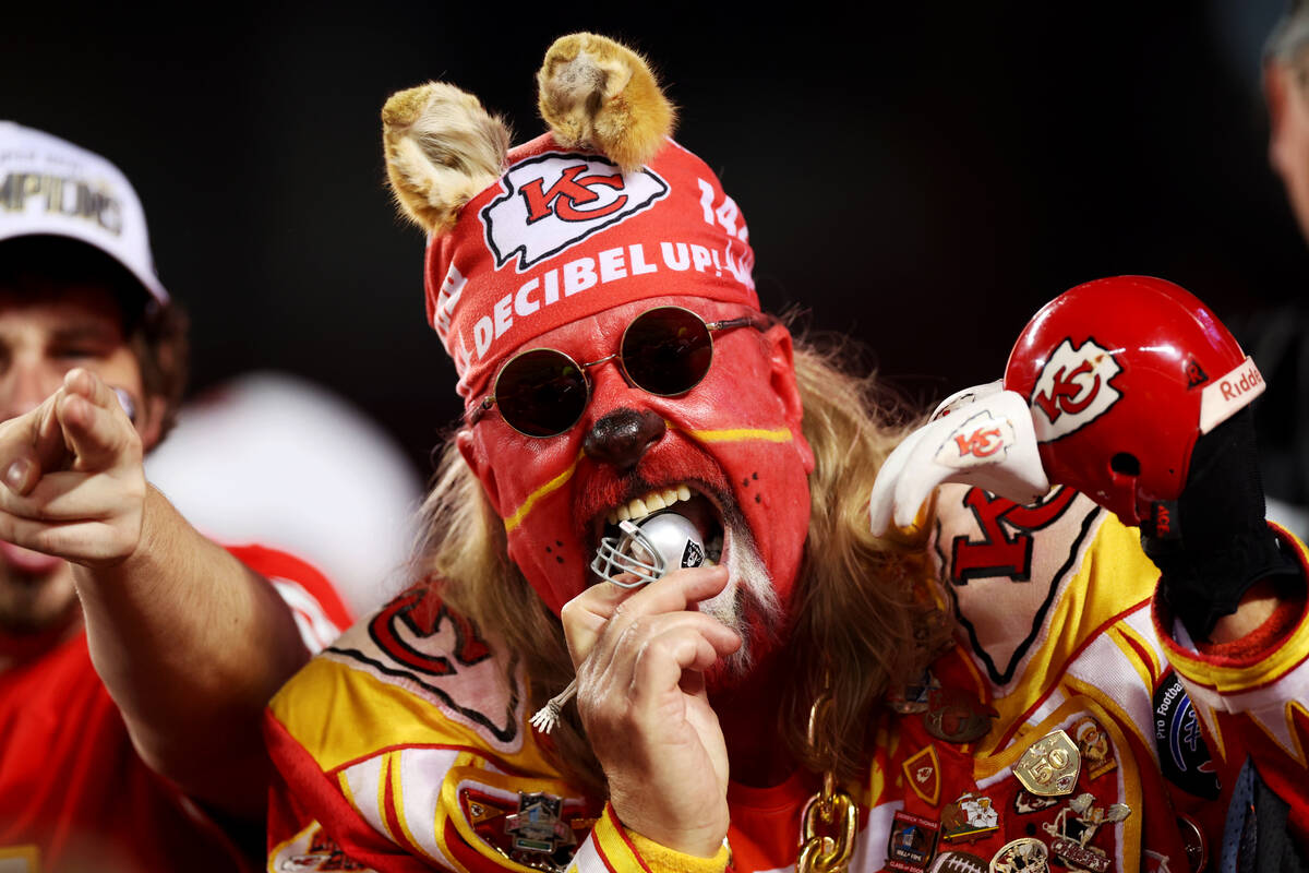 A fan poses during the first half of a NFL football game between the Raiders and the Kansas Cit ...