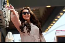 Singer/actress Sarah Brightman waves to the crowd during a ceremony to award her a star on the ...