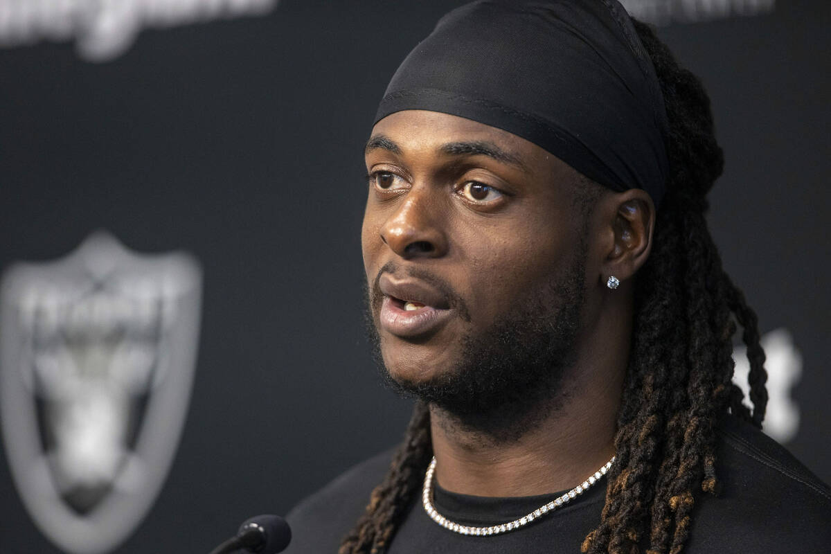 Raiders wide receiver Davante Adams responds to questions at a news conference following the te ...