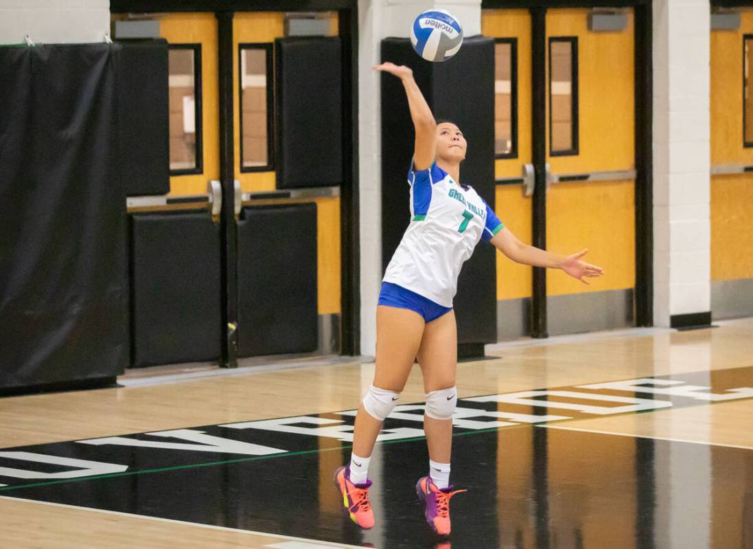 Green Valley’s Faith Arriola (7) serves the ball during a volleyball game at Palo Verde ...