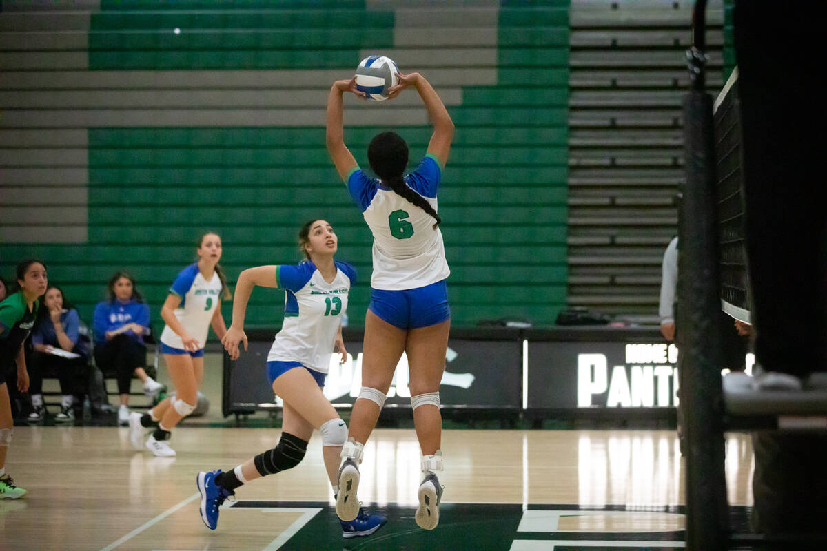 Green Valley’s Ensilina Savelio (6) sets the ball during a volleyball game at Palo Verde ...
