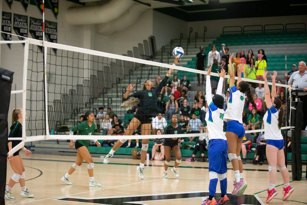 Palo Verde’s Naomi White (8) sends the ball back during a volleyball game at Palo Verde ...