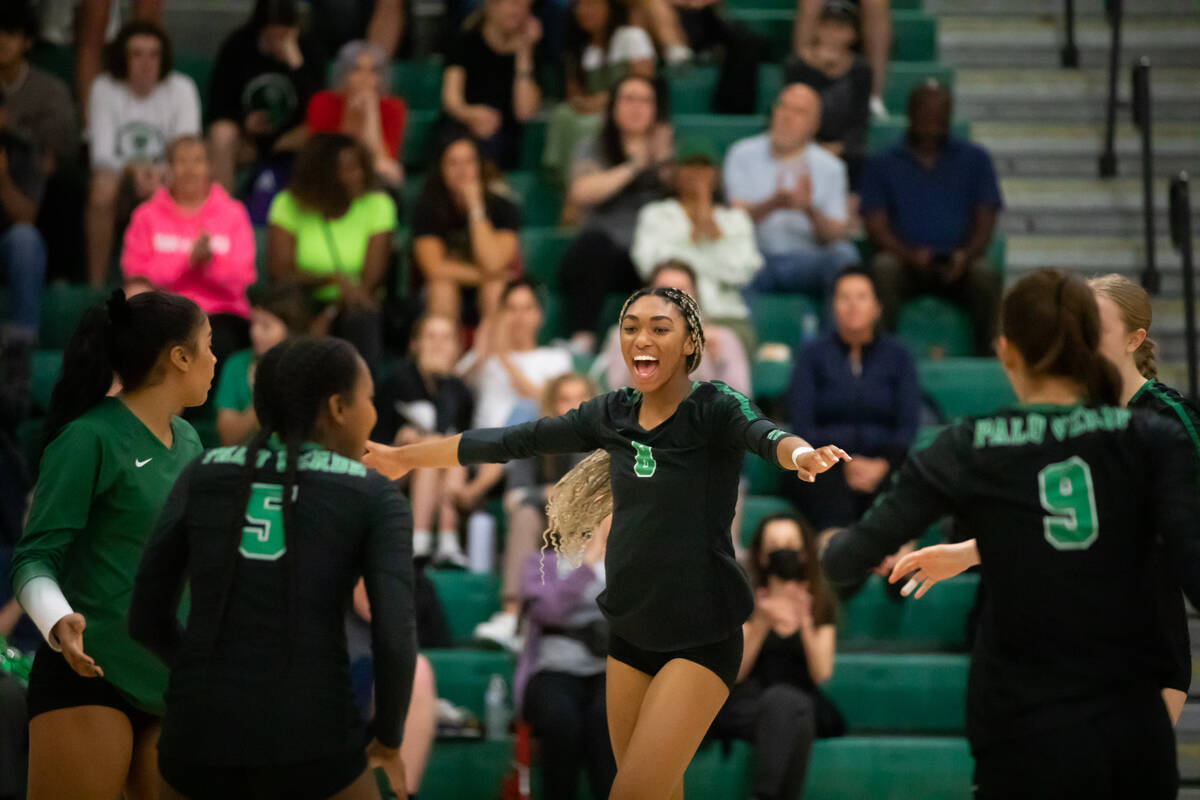 Palo Verde’s Naomi White (8) cheers with her team mates after scoring a point during a v ...