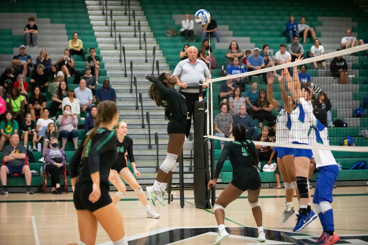 Palo Verde’s Deloris Nangah (11) serves the ball during a volleyball game at Palo Verde ...